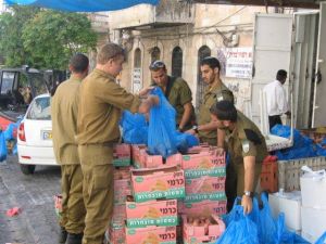 IDF Soldiers Came To Pack Food Baskets For The Needy